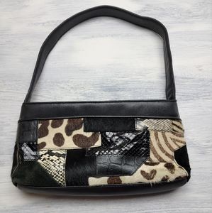 The Sak Black Temp Design Leather Purse Cowhide Look & Texture
